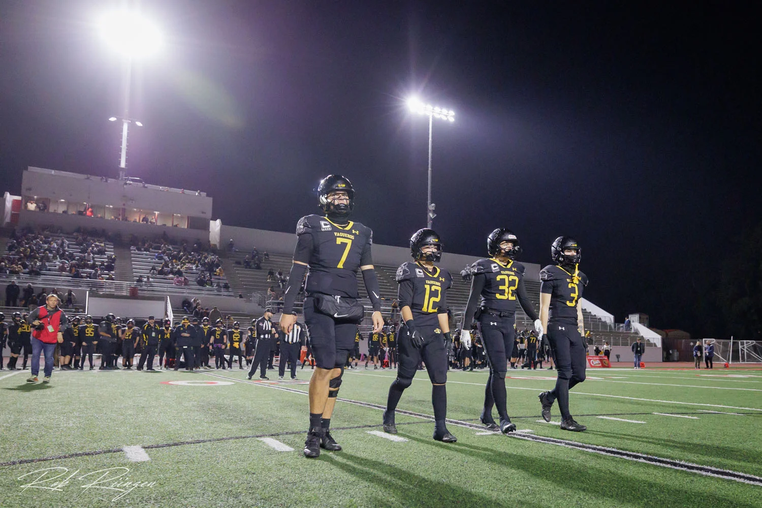 Captains walking out to the coin toss