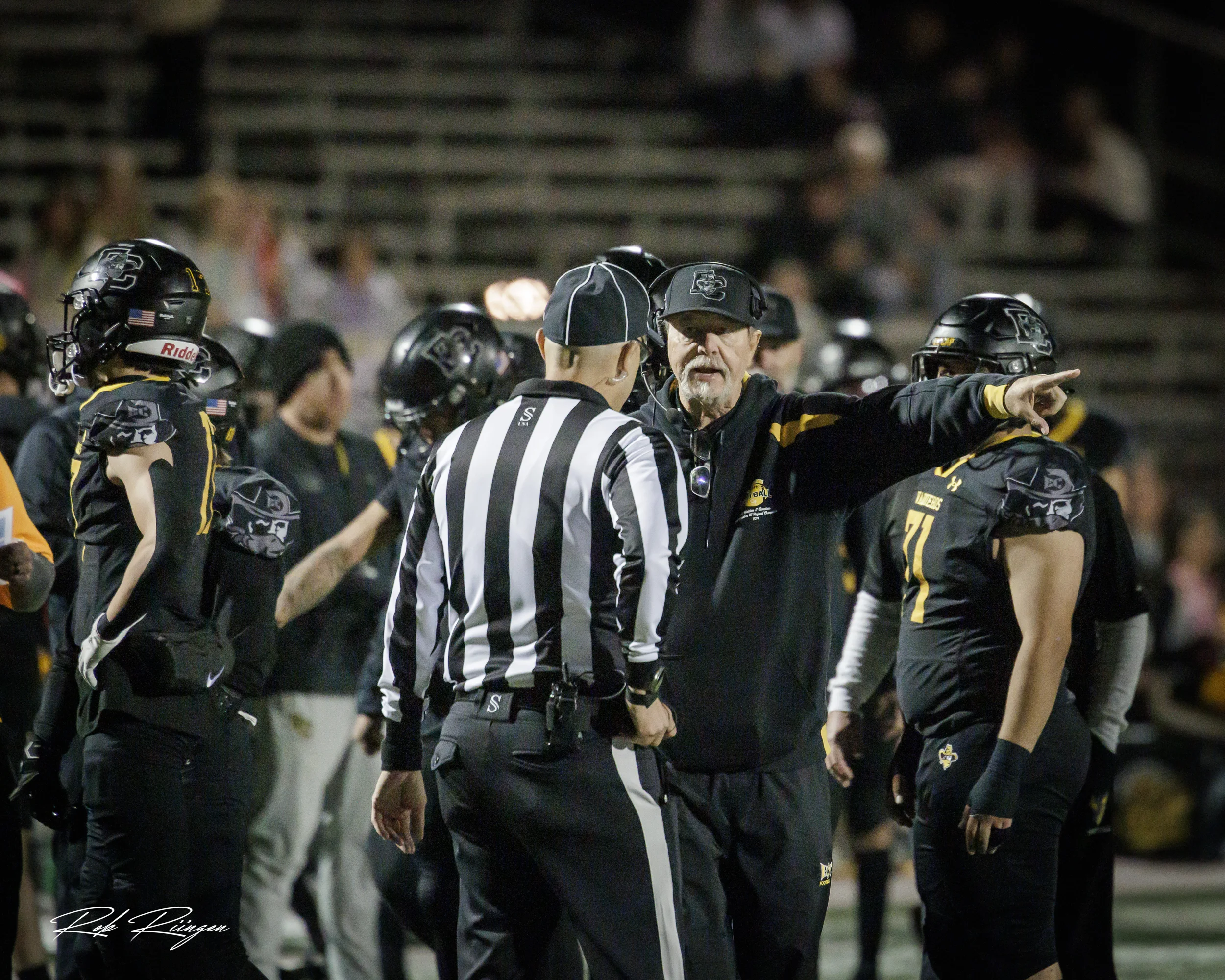 Coach talking with the Ref