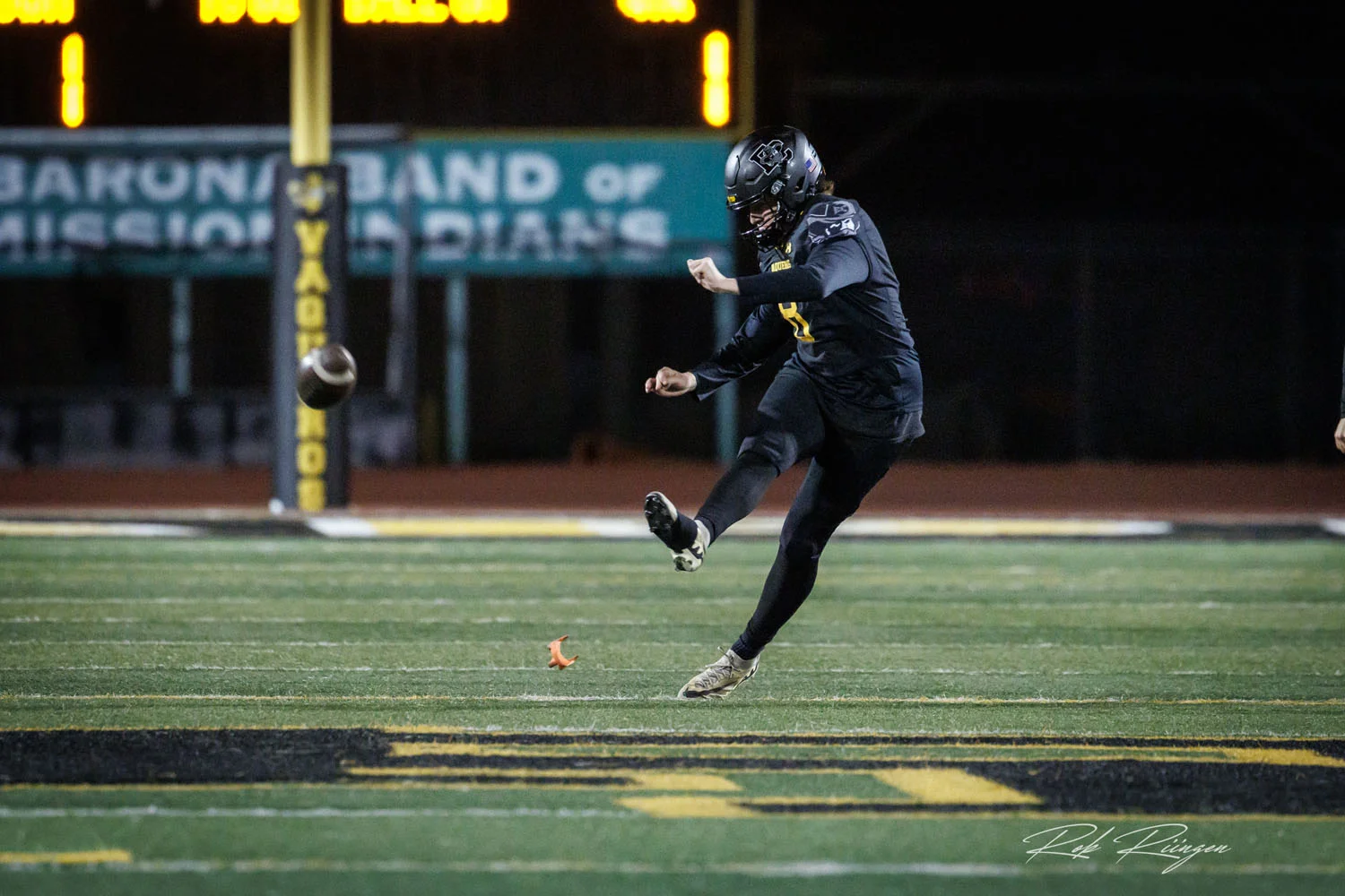 Kicking the ball to start the play