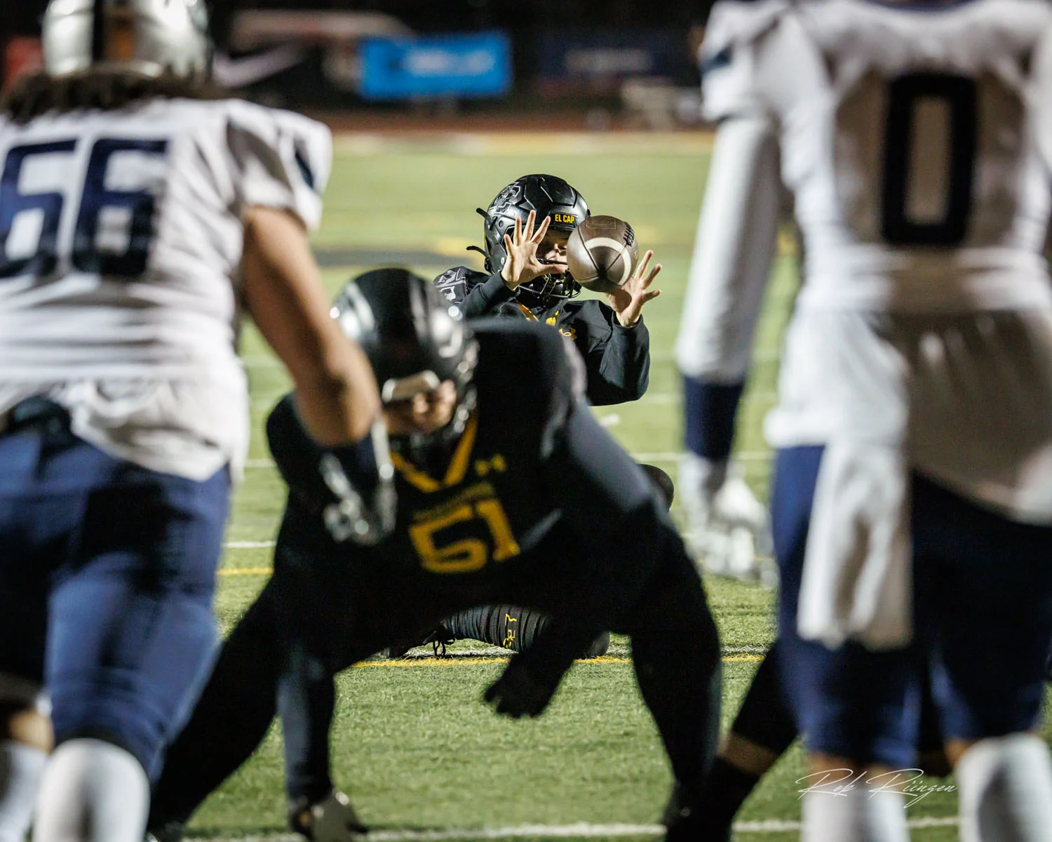 FG holder about to catch the ball