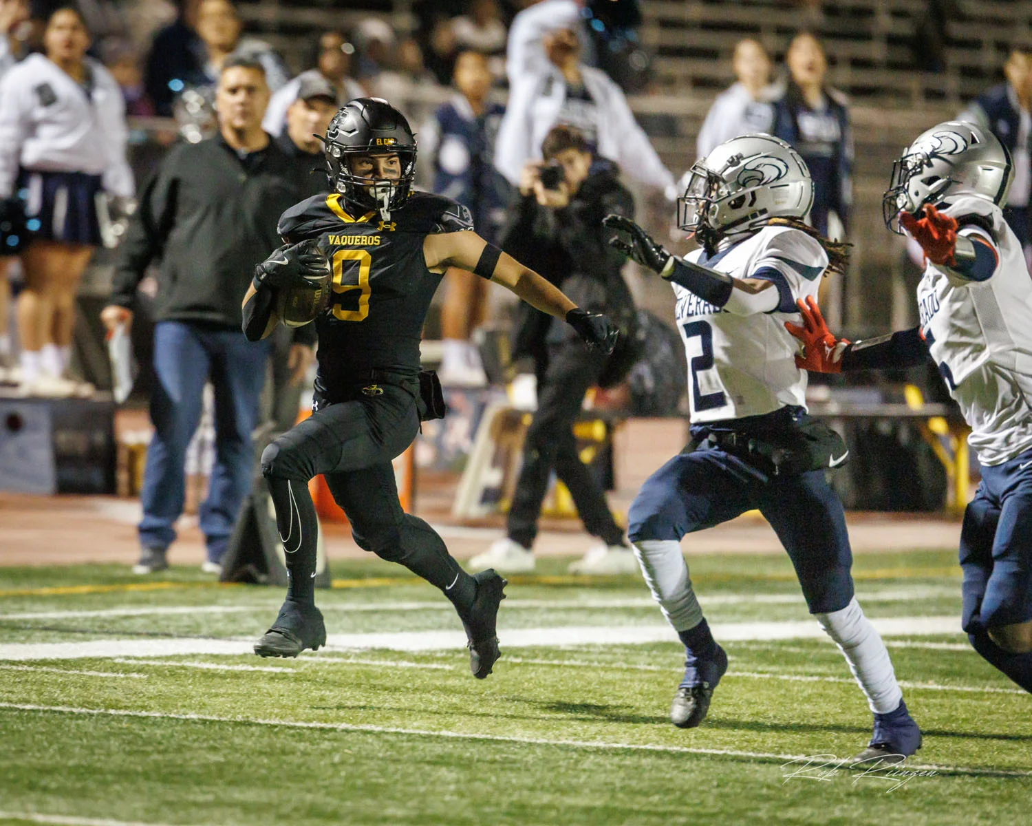 WR running down the field with the ball